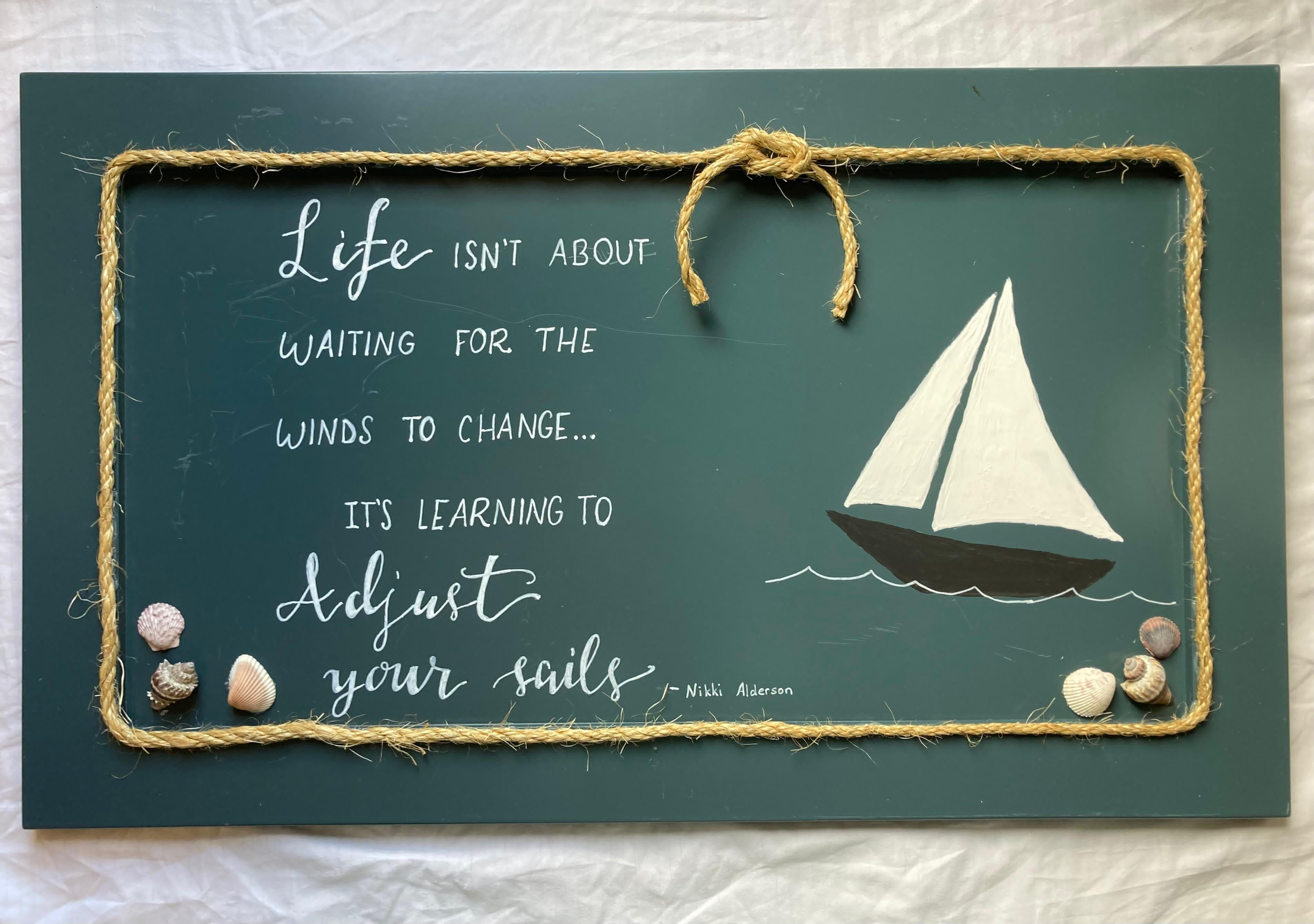 Life isn't about waiting for the winds to change, painted sailing sign