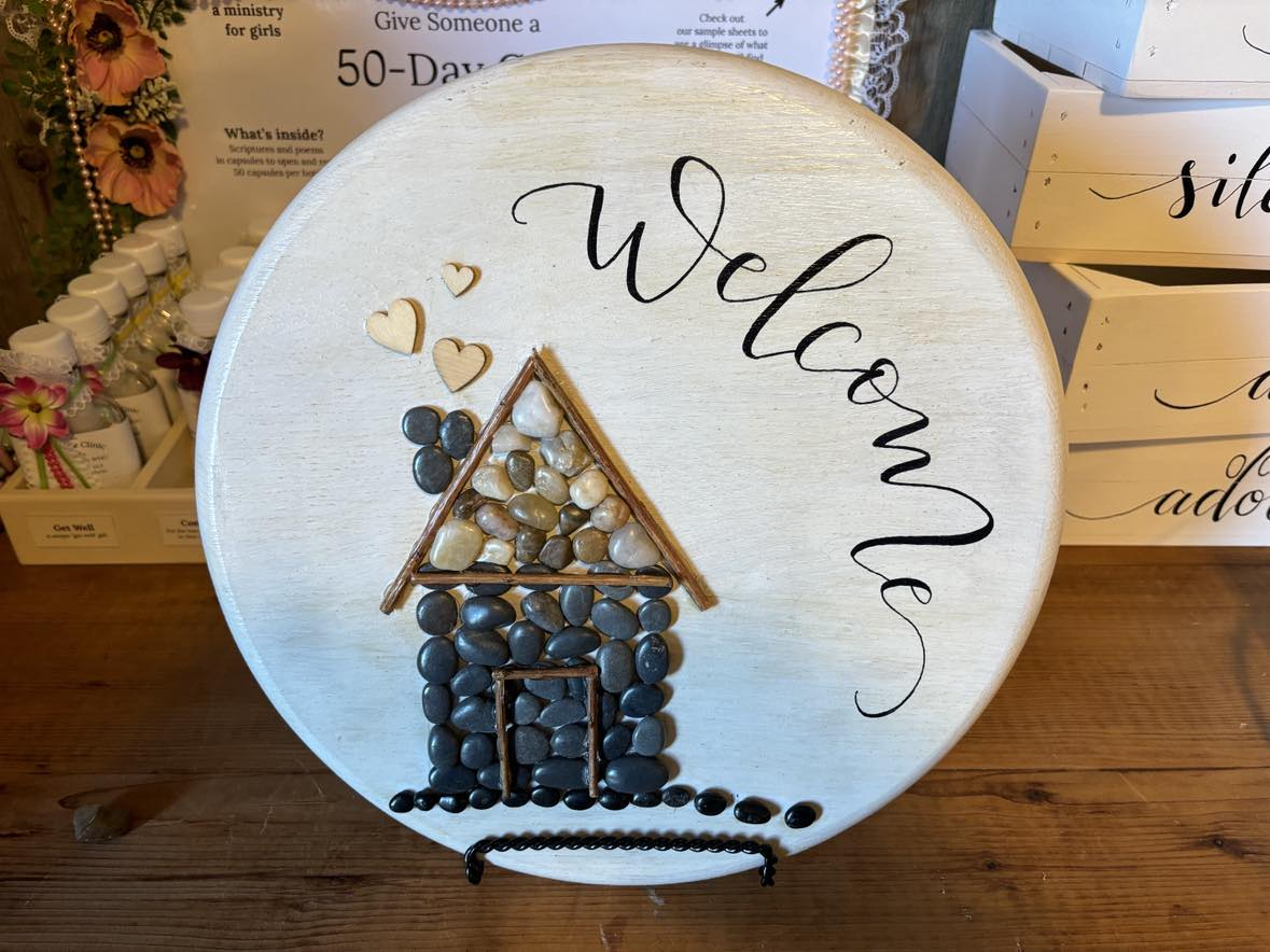 Welcome, pebble art house with hearts