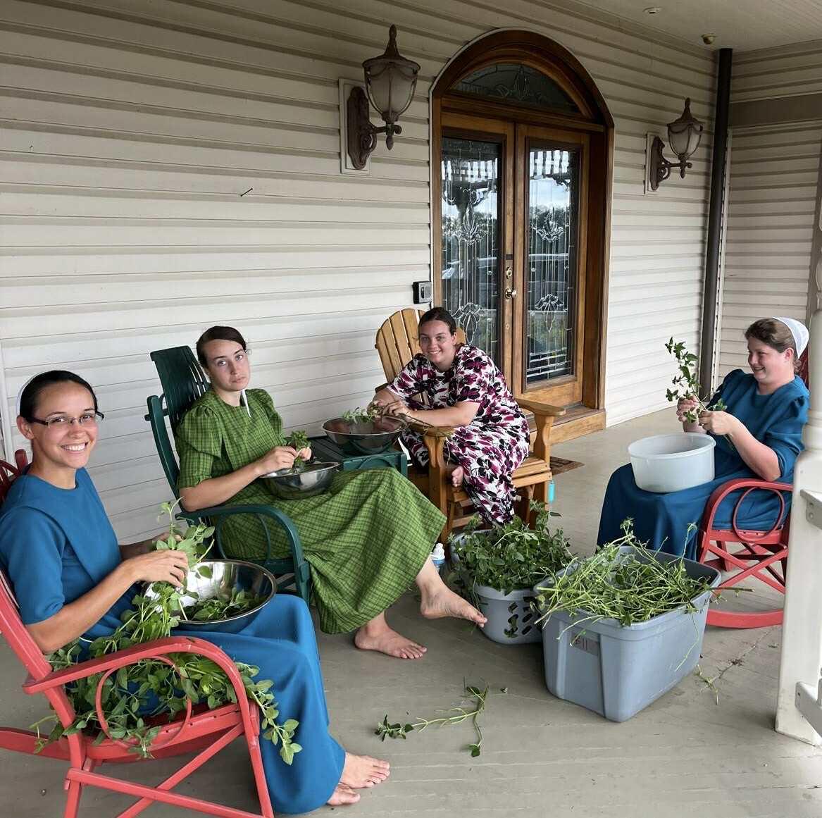 Women working together on the porch